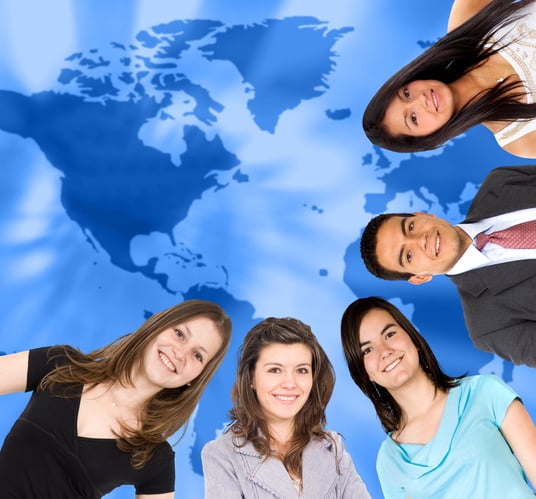 Group of people around a world map